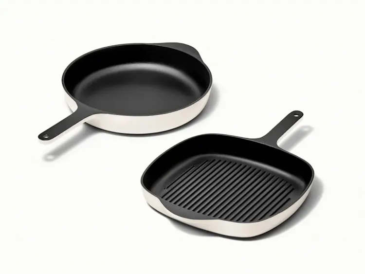 https://images.ctfassets.net/vitsw3itv0qj/491EYz8Nibl8lvAAlEawKZ/369775956845ca97b9fe202afe91a48c/Enameled_Cast_Iron_Skillet___Grill_Pan_Duo_-_Cream_-_Hero.jpg?q=75