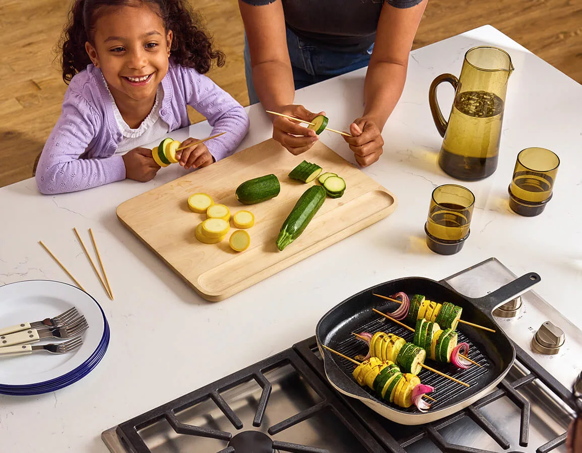 Cutting Board - Cast Iron Grill - Table - July Evergreen - Summer Evergreen - The Backyard, Upgraded - Hero - Desktop