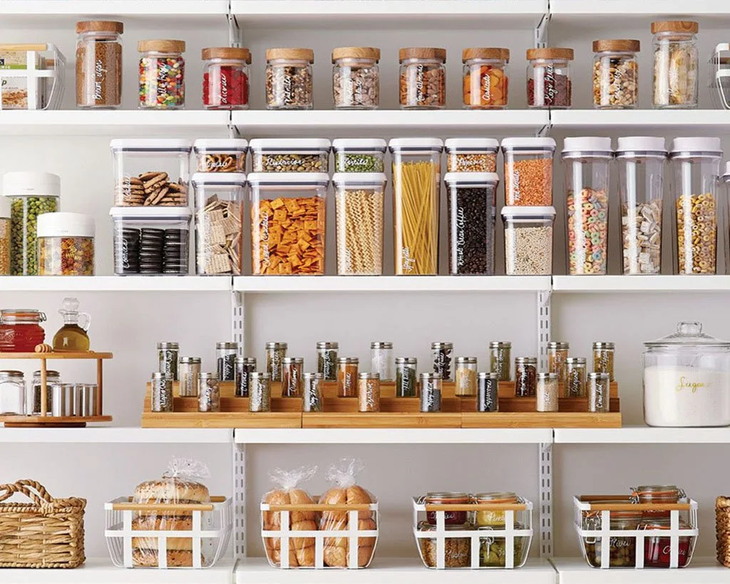 Food and spices being stored in containers on a shelf