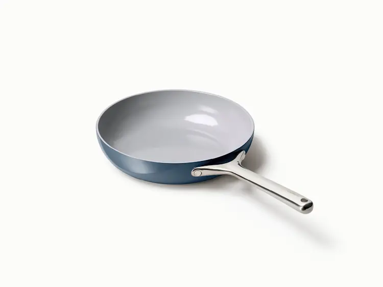 https://images.ctfassets.net/vitsw3itv0qj/6VxTNStYt2mgBYwOqLbS9d/68534683951606328834b76bdd2172ff/Ceramic_Fry_Pan_-_Navy_-_Hero.jpg?q=75