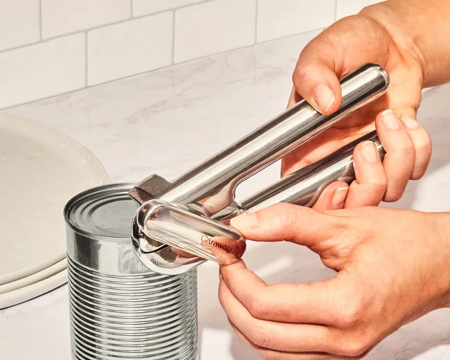 Stainless Steel Can Opener - In use - Opening a Can