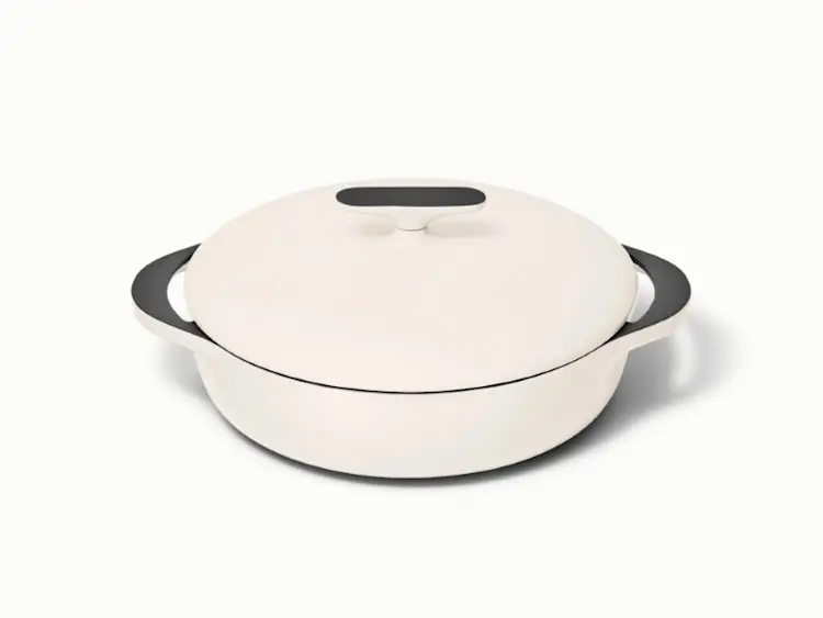 https://images.ctfassets.net/vitsw3itv0qj/7oFRHNn7PZdNjat8DQwXpW/2bf28463a1b0da7207ea7e8512e4c0a0/Enameled_Cast_Iron_Braiser_-_Cream_-_Hero.jpg?q=75