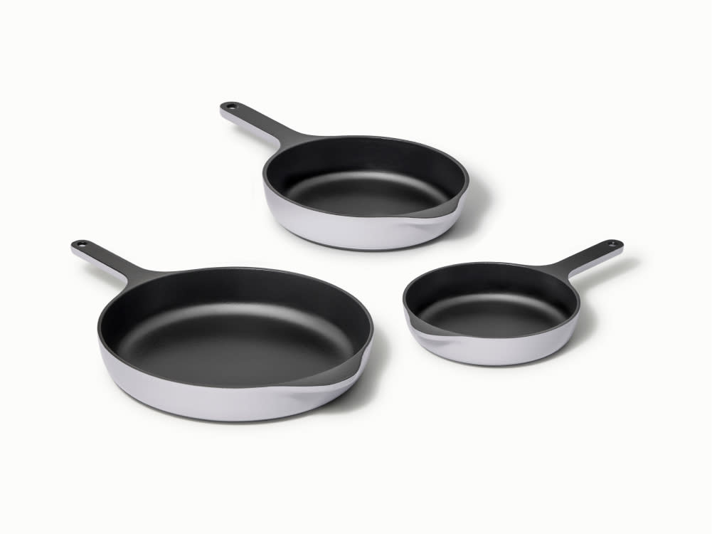 https://images.ctfassets.net/vitsw3itv0qj/7xbu8GKirQnbU0F8uVfD0i/2d6151ad9300578ac0a37e08b44a0642/Enameled_Cast_Iron_Skillet_Trio_-_Gray_-_Hero.jpg?q=75