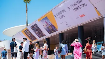 Signs mentioning learning and talent initiatives at Cannes Lions.