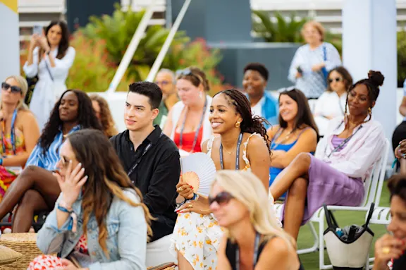 Audience enjoying a talk on the terrace at Cannes Lions