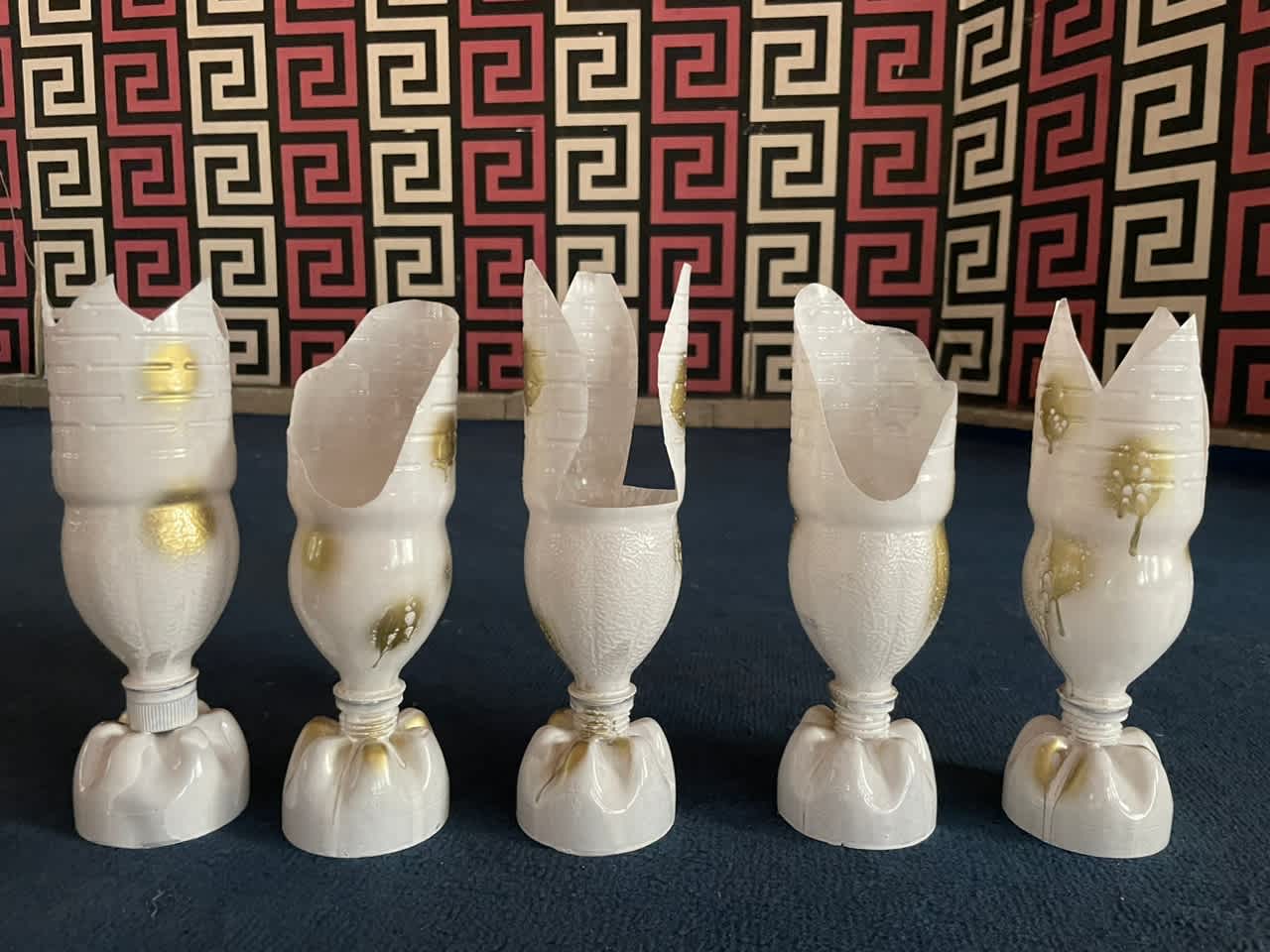 Final product of the flower vases created from plastic bottles.