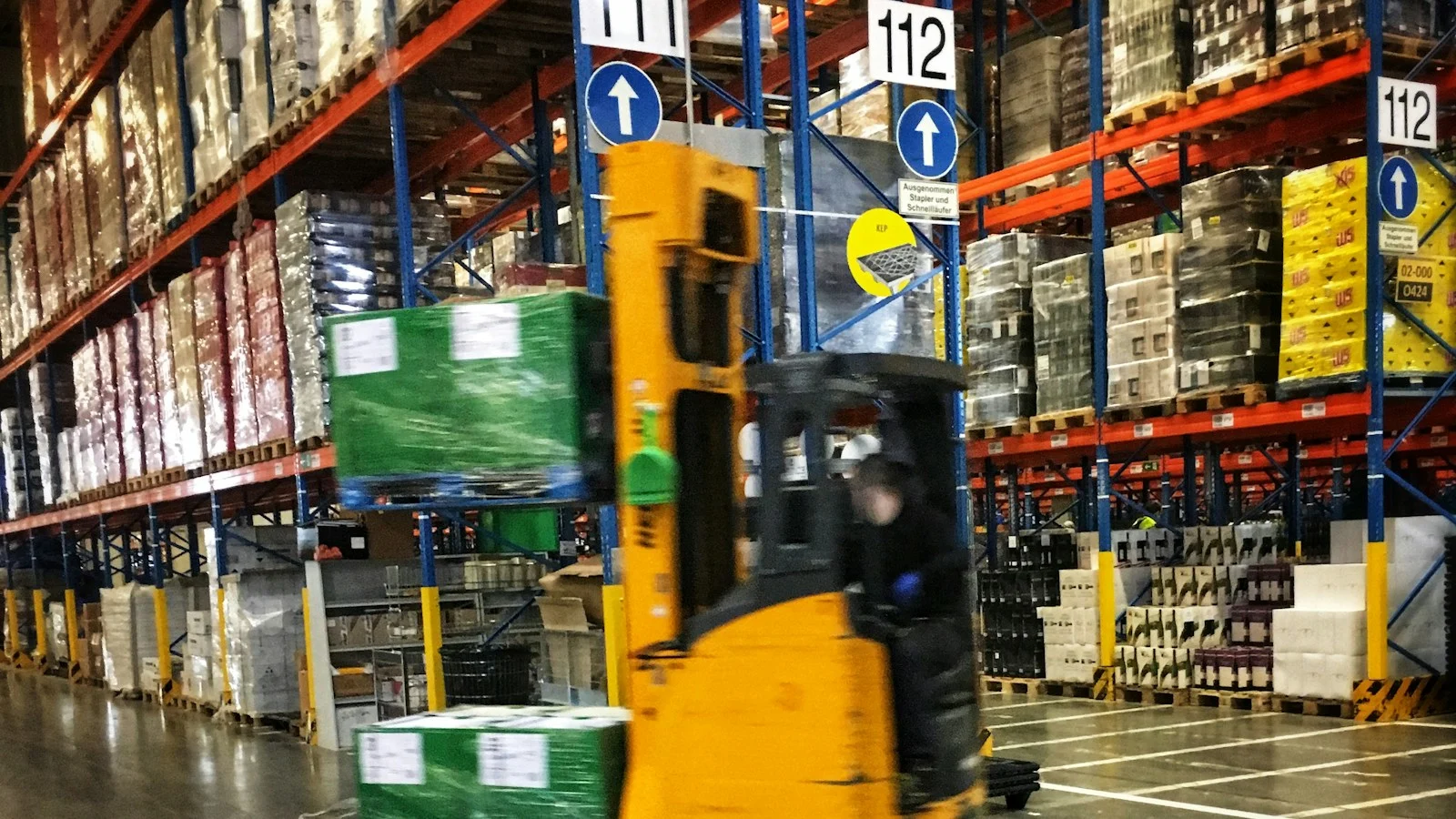 Section 179 deduction explainer showing a forklift used in warehouse operations