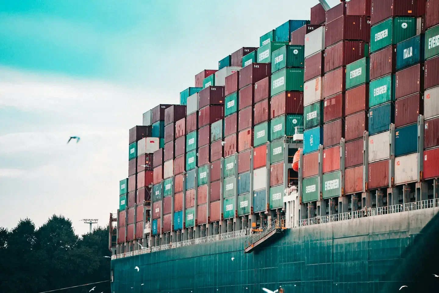 a large cargo ship loaded with lots of containers