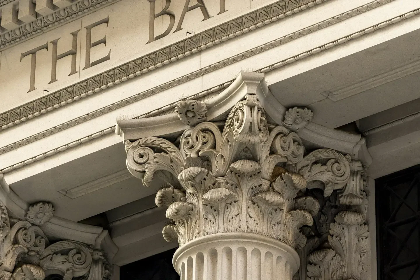 The bank of ornate classical columns and facade