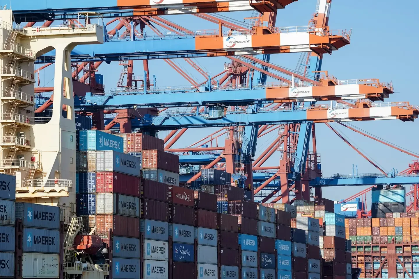 Cargo ship loaded with shipping containers at a port