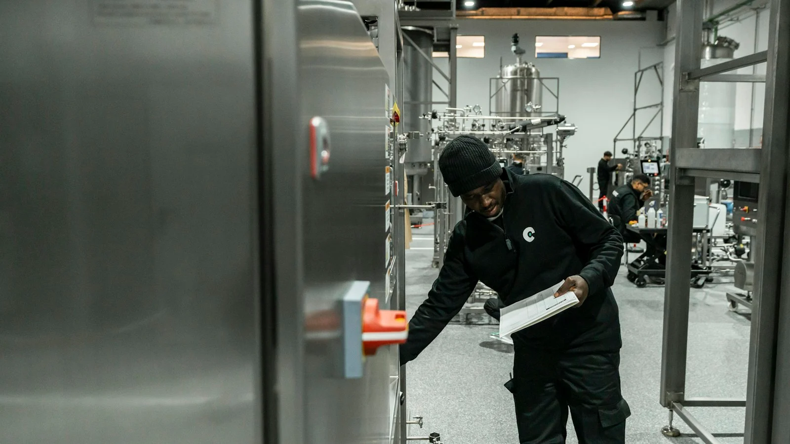 temporary importation bond: An operator inspecting industrial equipment
