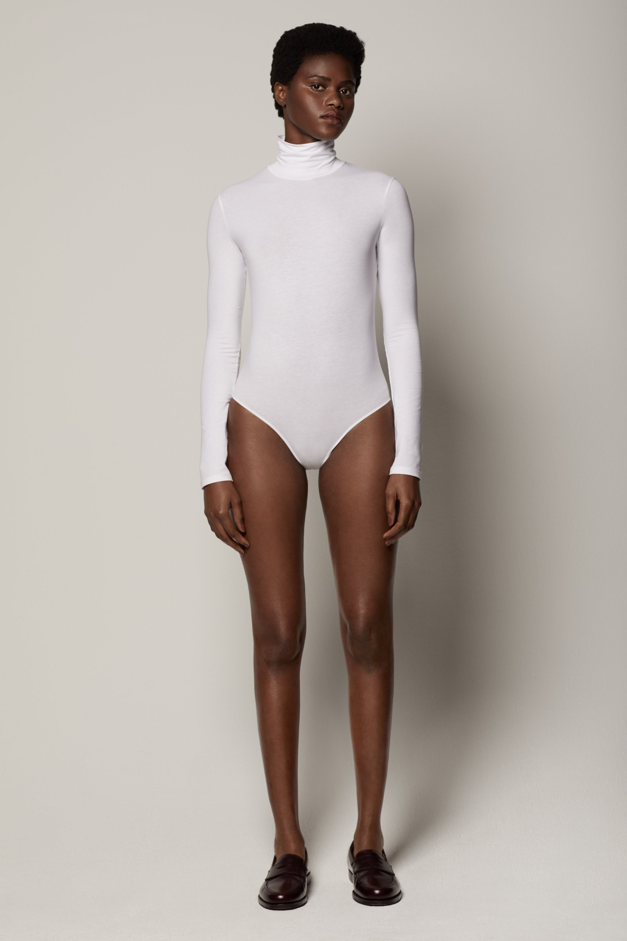 long sleeve white turtleneck bodysuit