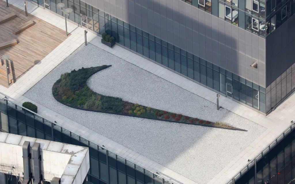 Nike logo on top of building