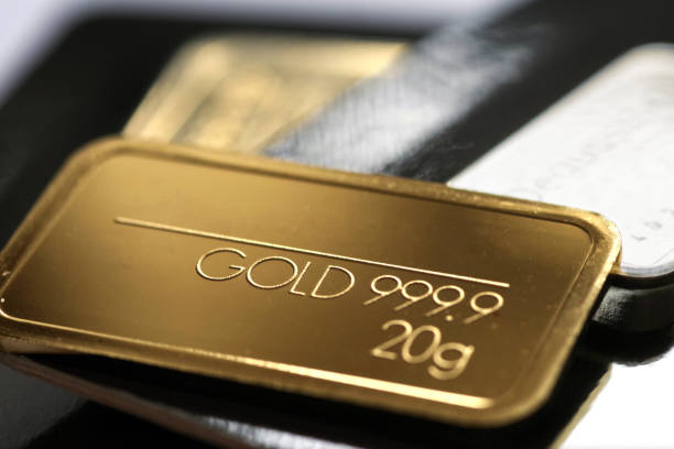 Minted gold bar close-up hero image