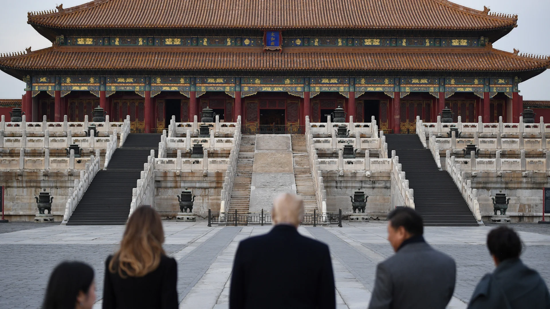 US President Donald Trump, First Lady Melania Trump, China's President Xi Jinping and his wife Peng Liyuan look at the Forbidden City in Beijing on November 8, 2017
