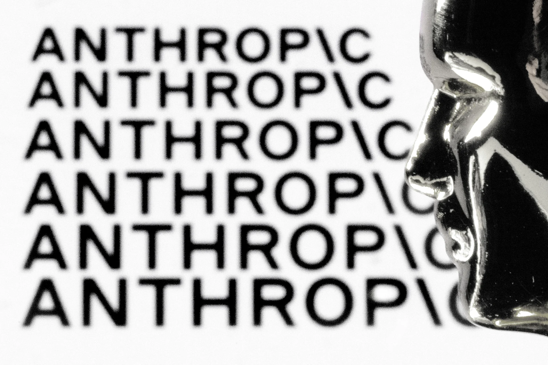 Anthropic logo with face