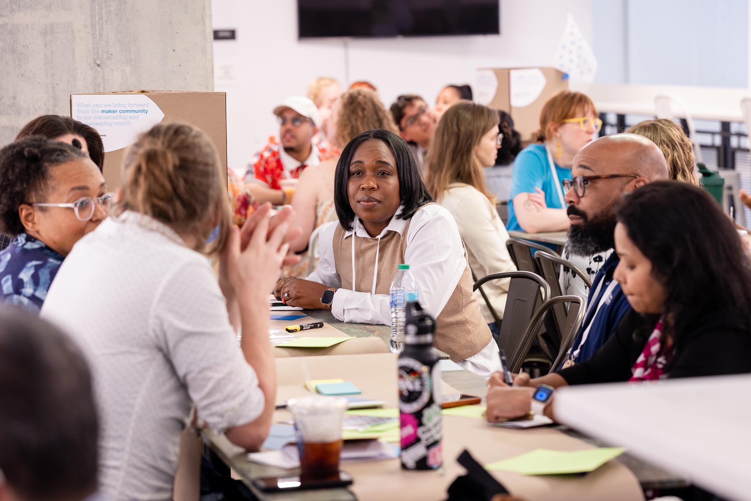 Attendees from all disciplines share their views on various topics during a mixer event.