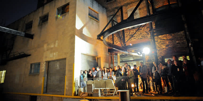 Performance on the industrial patio, photo by Area 405.