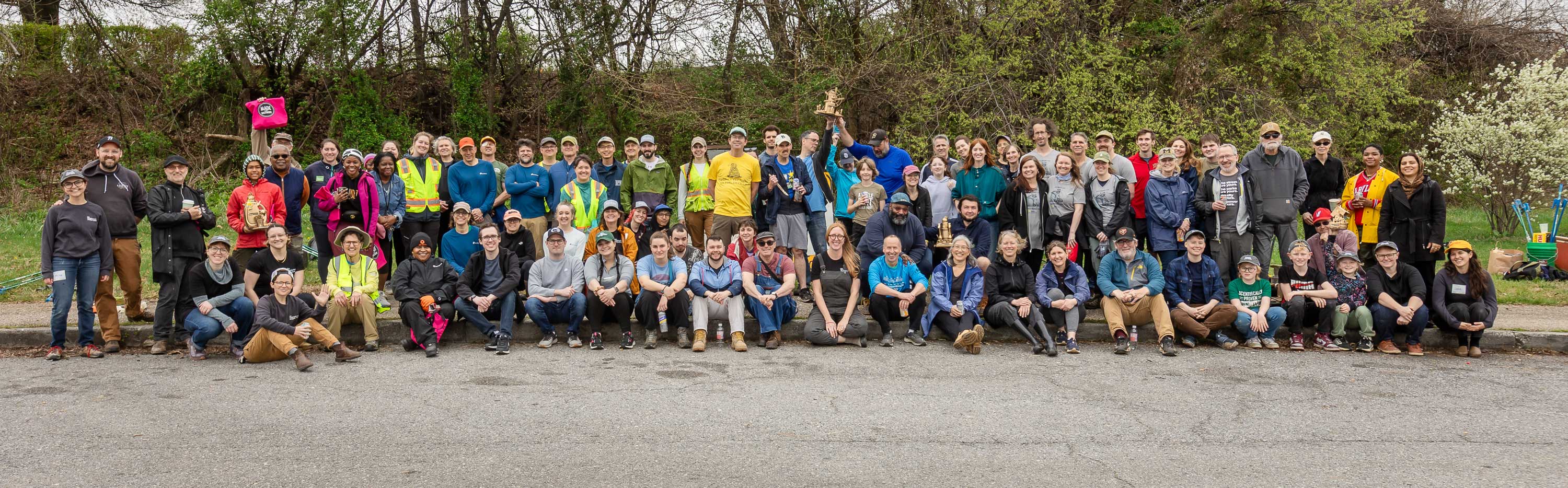 Entire group of trash dash attendees posed with trophies.