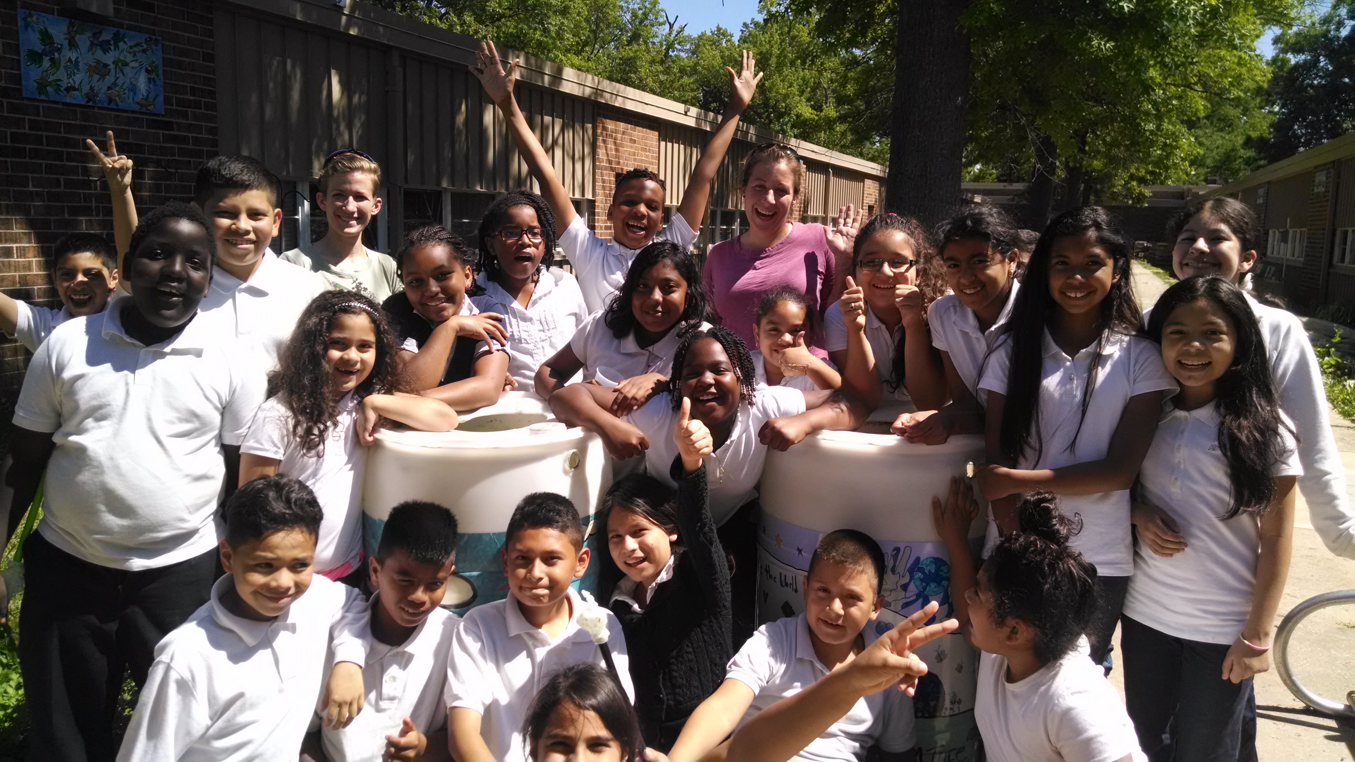 Kelley and students at an installation celebration