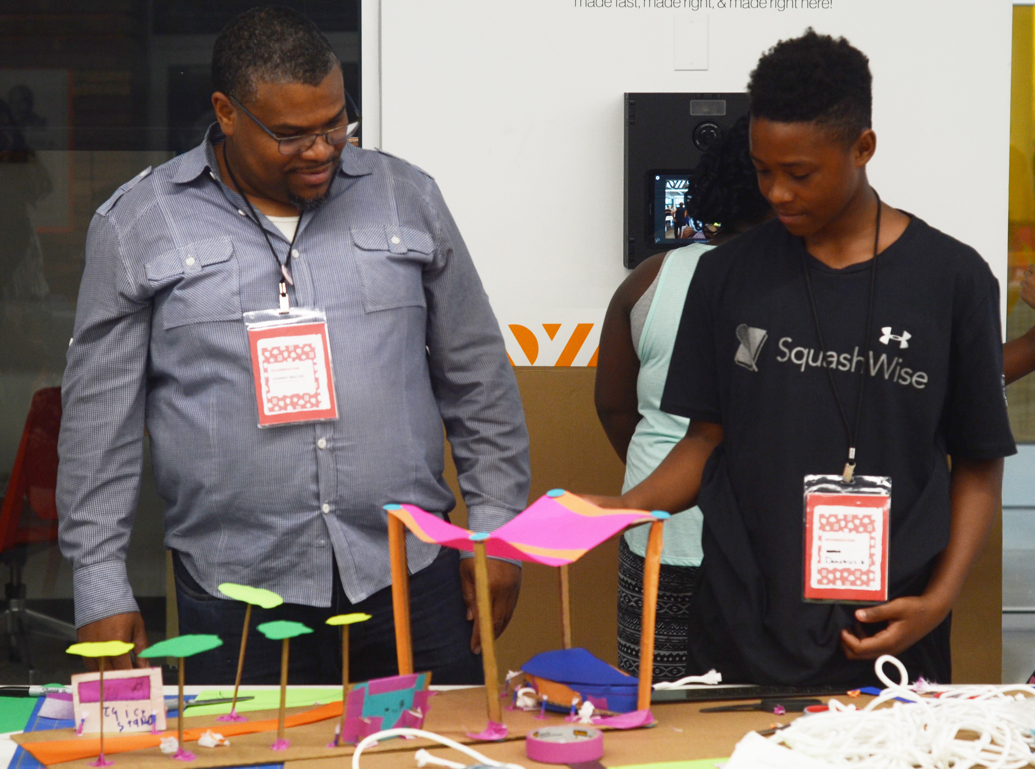 NDC’s Johnny Macon assists a student in prototype design.