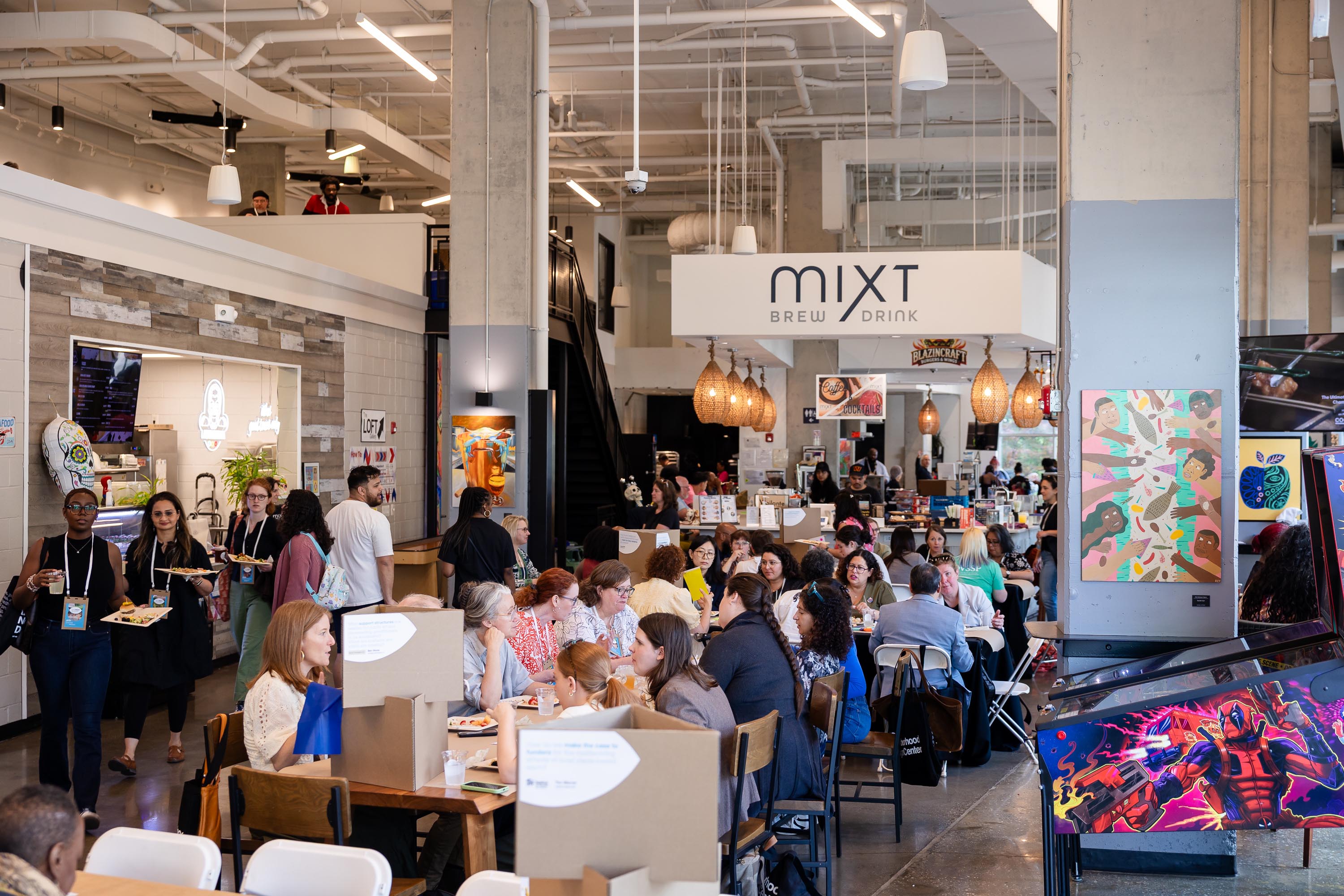 The Vision is Yours Placemaking and Placekeeping Conference 2026 participants at welcome breakfast at miXt Food Hall.