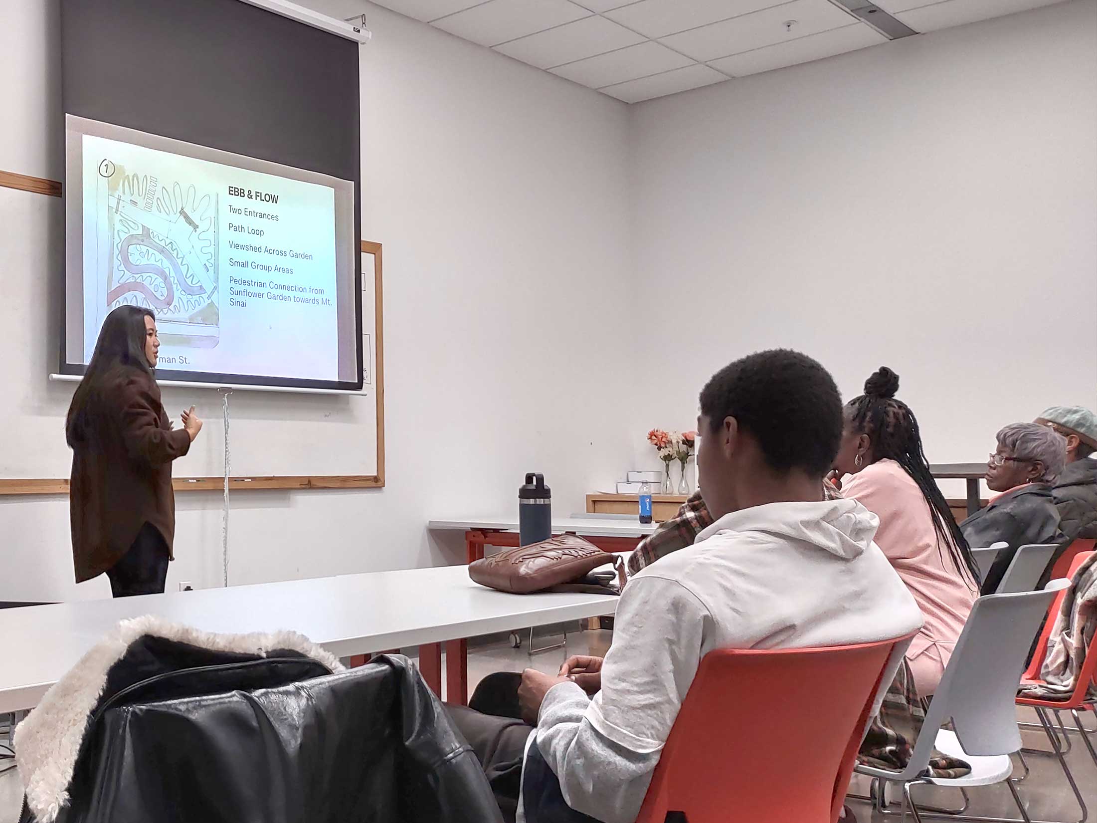 Ada presenting at the monthly community meeting.