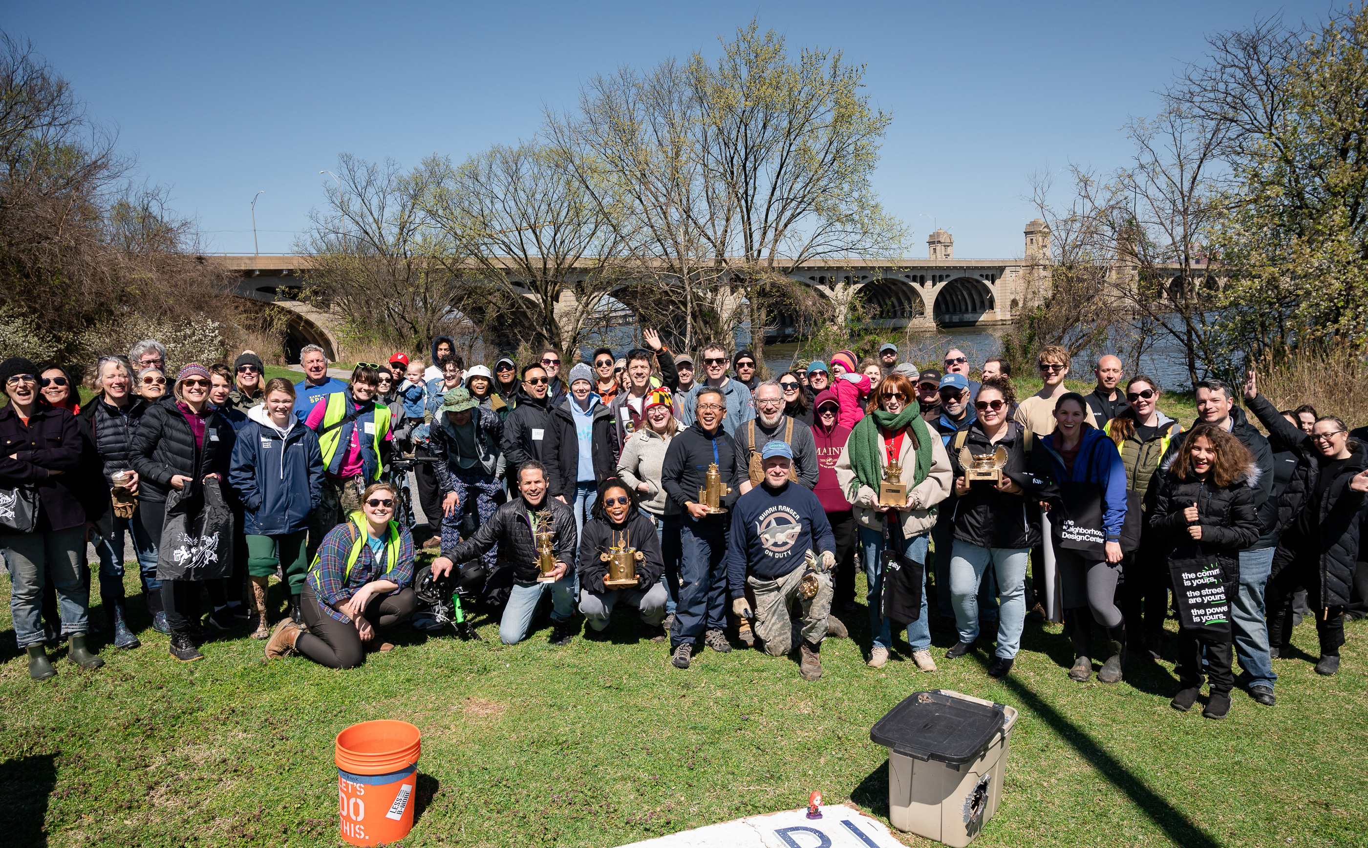 Teams celebrating at Trash Dash 2023, Middle Branch Park.