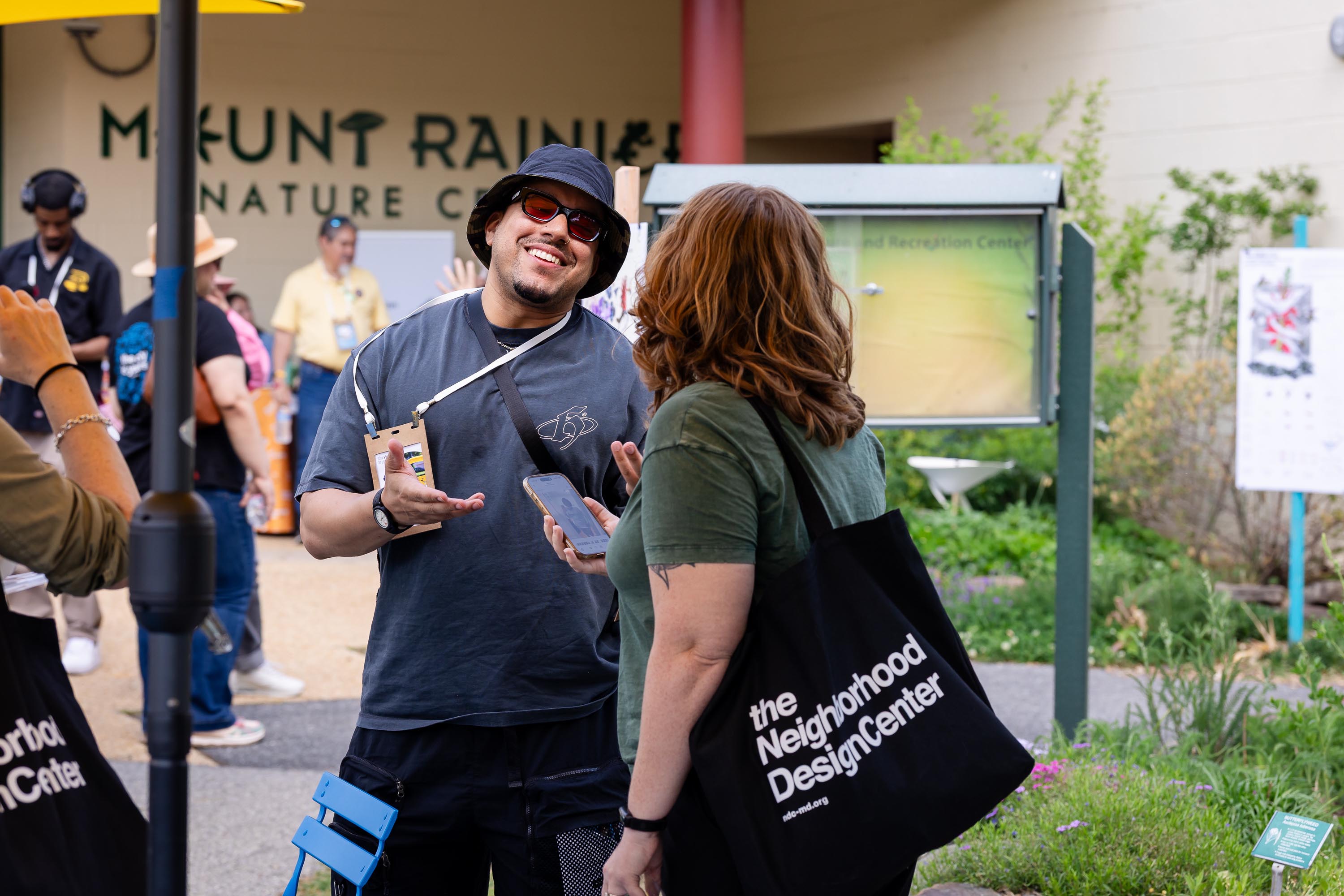 The Vision is Yours Placemaking and Placekeeping Conference 2026: smiling participants in one-on-one conversation.