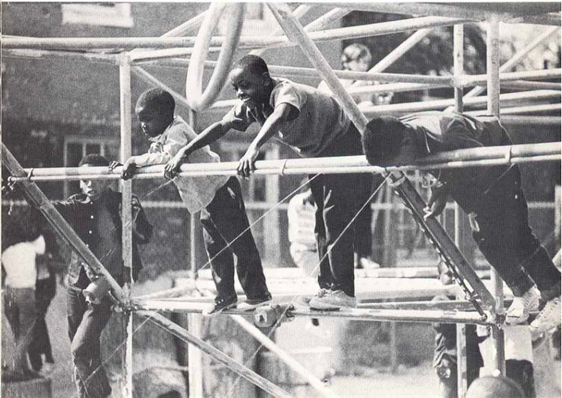 Children playing on an NDC designed playground in 1971