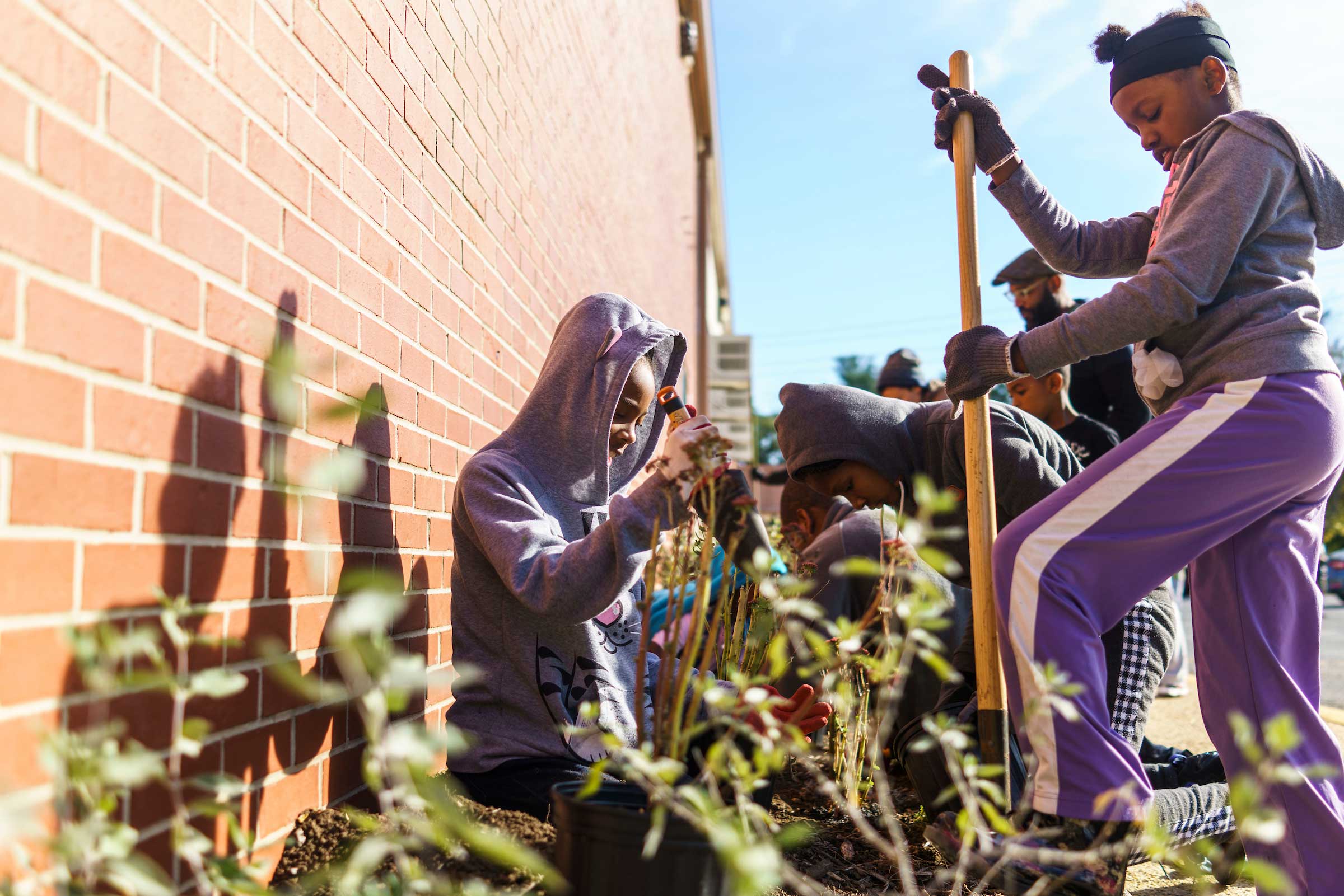 NDC leads a planting day at John Bayne ES. Photo by Matt Roth.