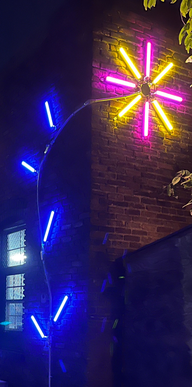 Blue Light Junction exterior, an example of the vibrant public art Station North is known for.