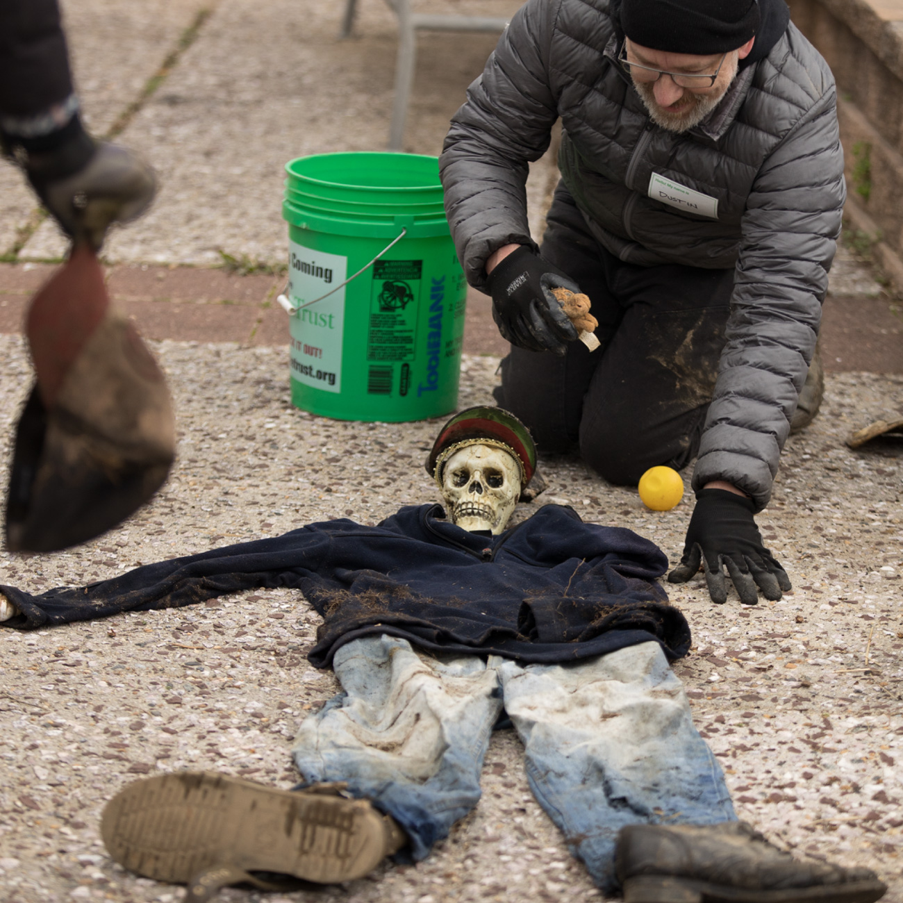 Board member creating humorous found art.