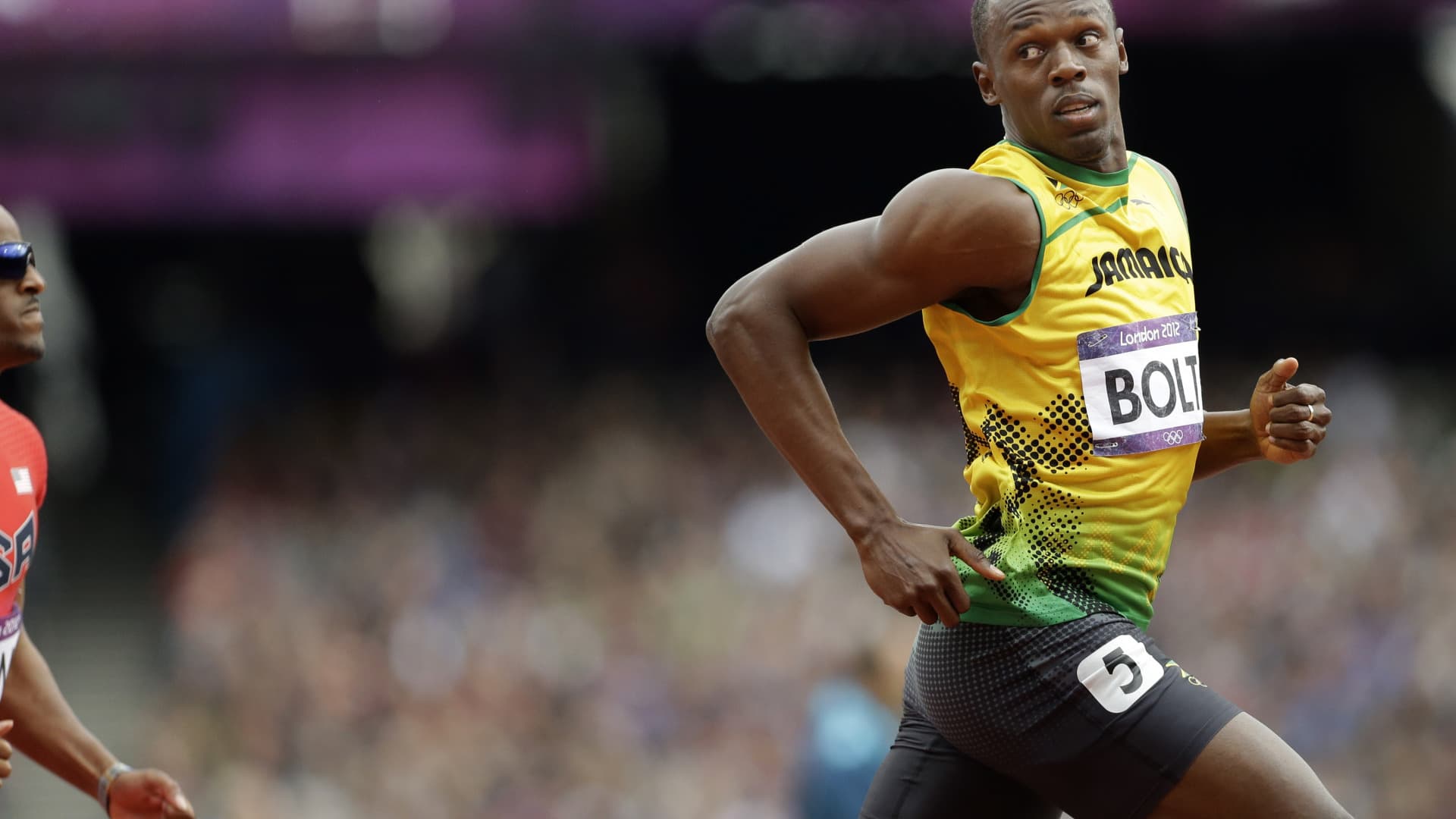  Jamaican sprinter Usain Bolt competes in the men's 100m final at the London 2012 Olympics.
