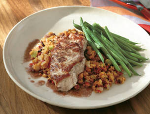 Spanish Pork Chops with Linguica Corn Stuffing and Wine Gravy
