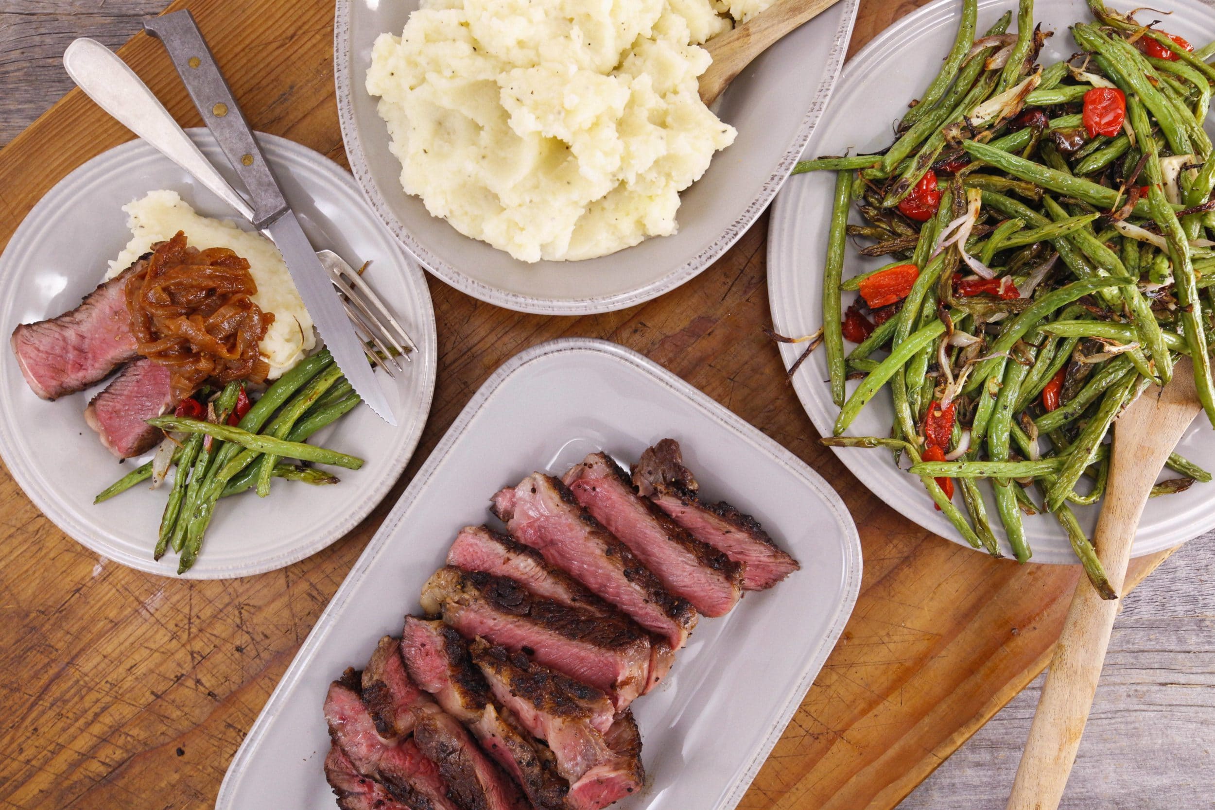Sliced Steak with Pimenton Barbecue Onions, Roasted Green Beans and...