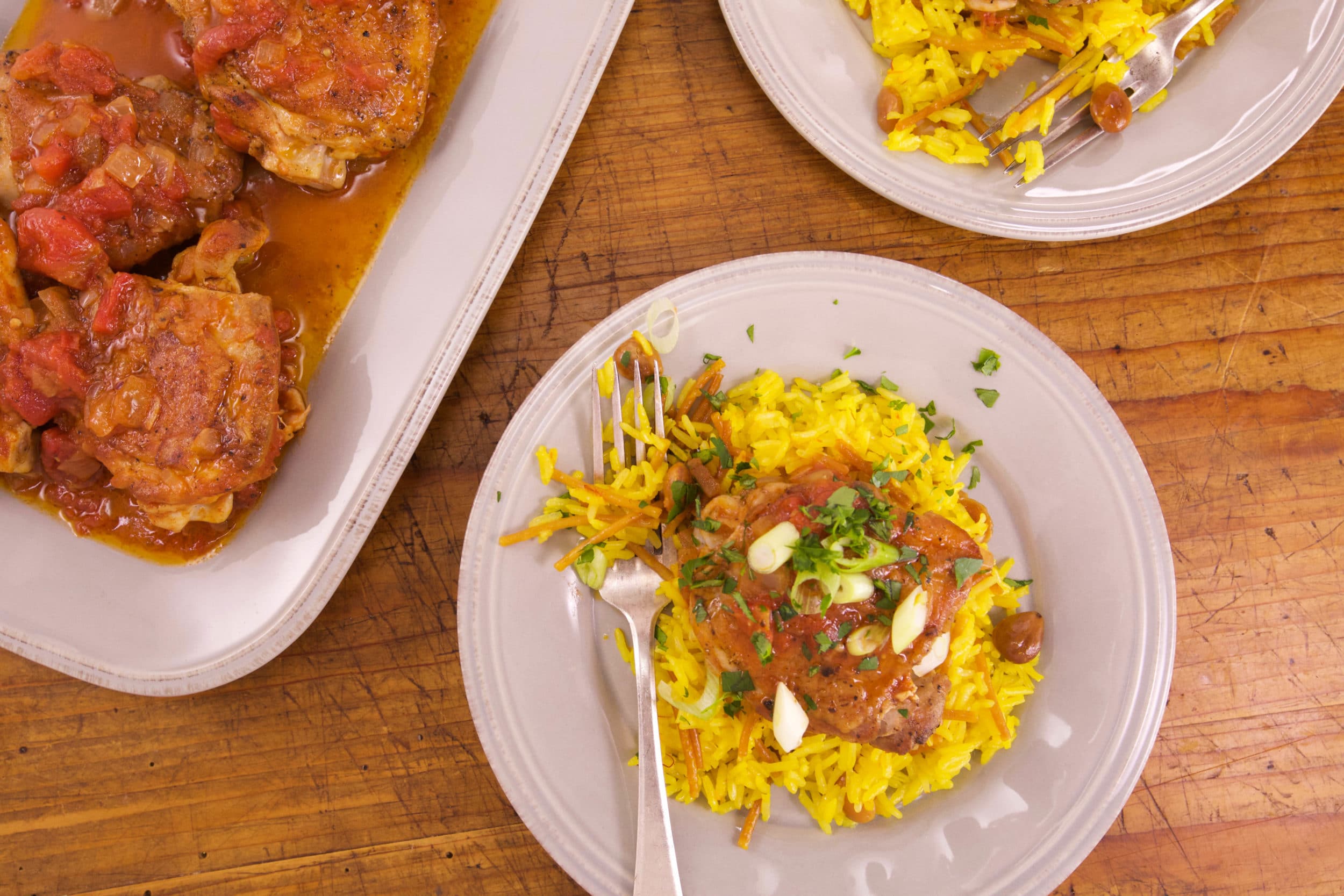 Spanish Chicken Thighs with Tomato and Saffron Rice with Almonds