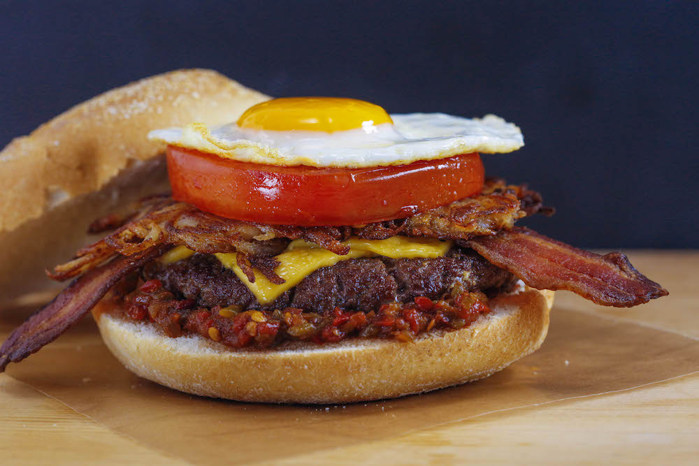 Bacon, Egg and Cheeseburger on a Roll with Spicy Mustard...