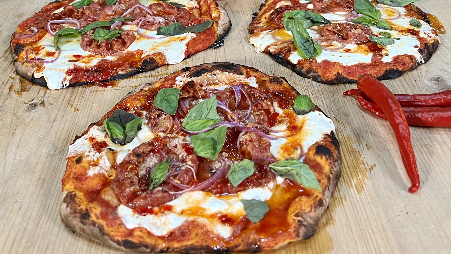 Thin and Crispy Pizza with Sopressata, Red Onion and Hot...