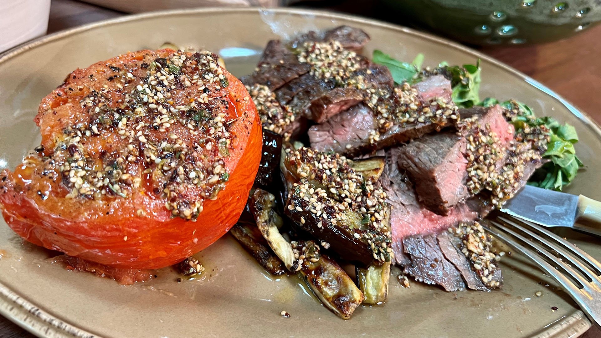 Beef Steaks with Za'atar Dressing, Roasted Tomatoes and Eggplant, Greens...