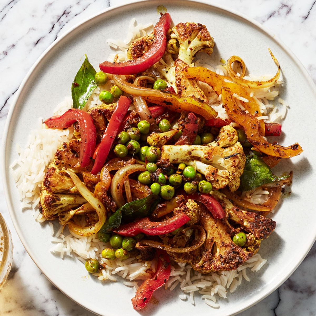 Indian Spiced Cauliflower with Peas, Peppers & Basmati Rice