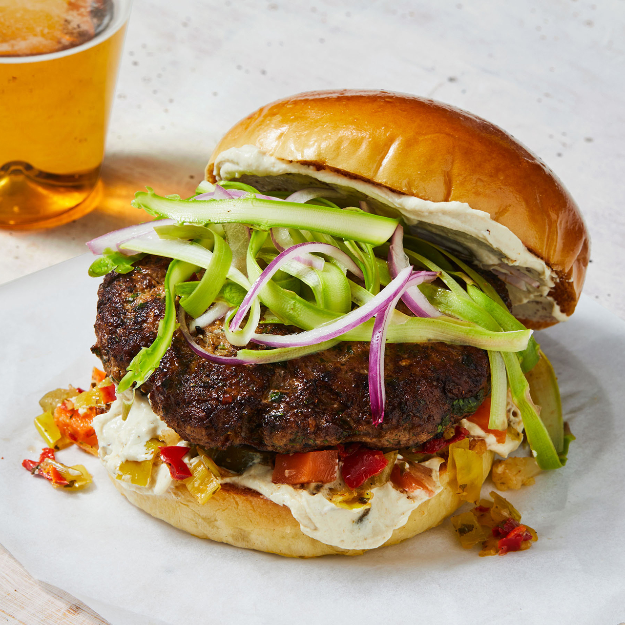 Herby Lamb Burgers with Shaved Asparagus & Tahini-Yogurt Sauce