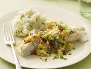 Halibut with Corn Chowder Gravy and Sour Cream and Chive...