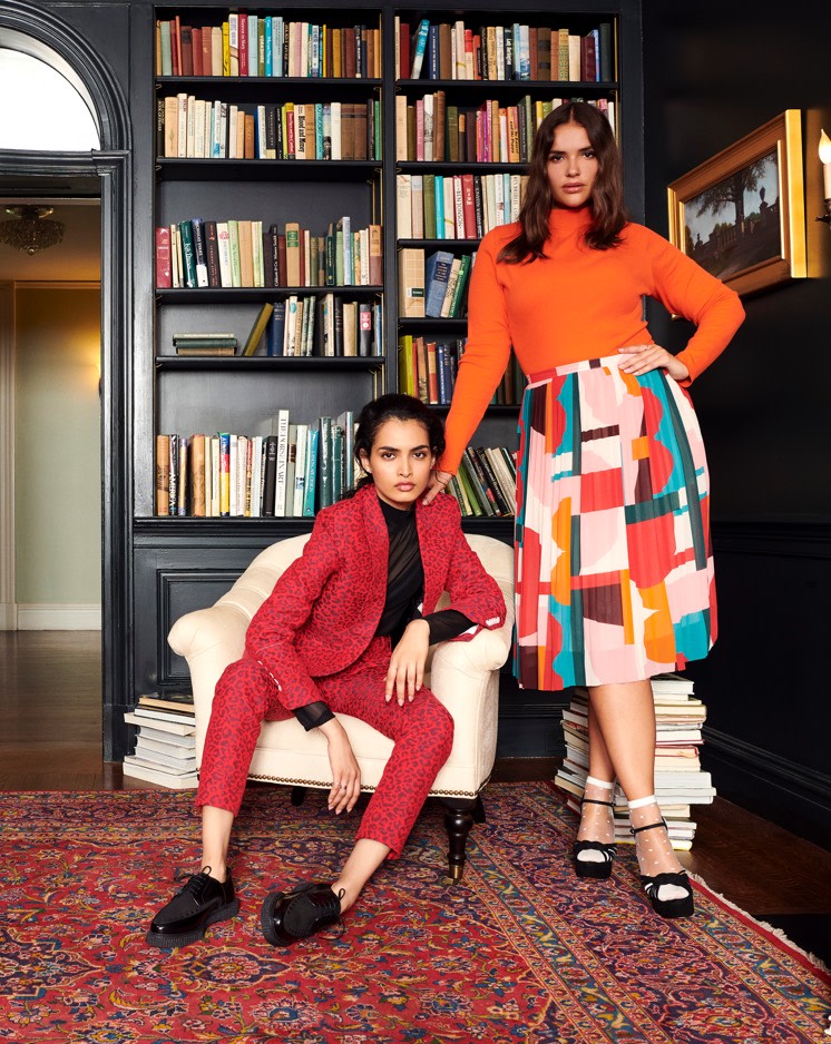 Model wearing a head to toe animal print look and another wearing a geometric skirt with bold colors.