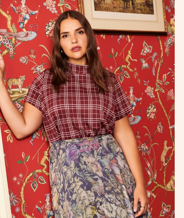 Pair a plaid top with a floral print flowy skirt!