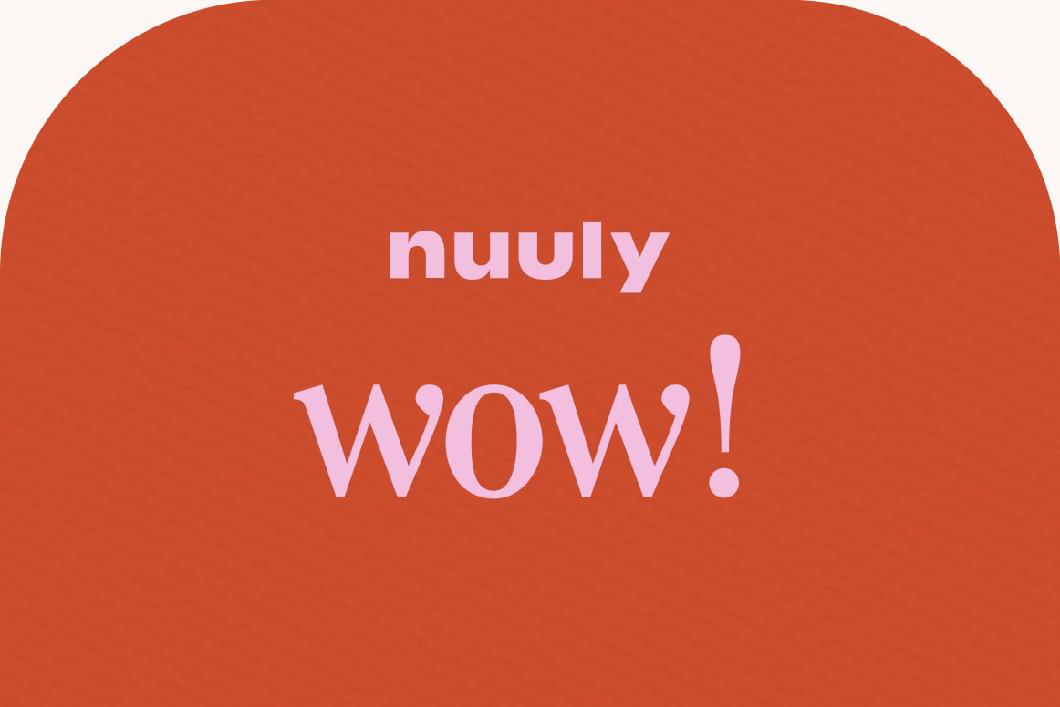 Nuuly gift card with the message ‘nuuly wow’ on a red-orange background.