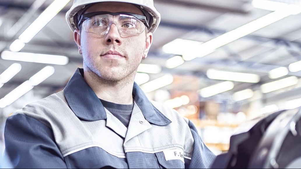 Image of an NDT Global employee with an inline inspection tool