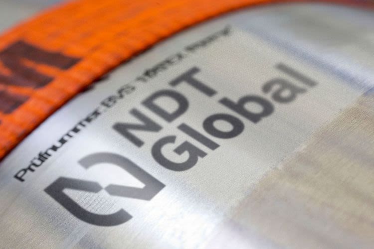 NDT Global logo on metal
