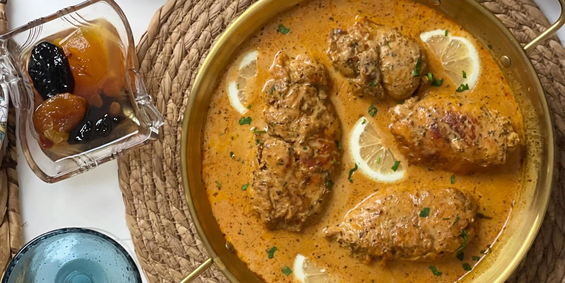 Bowl of chicken with tomato sauce