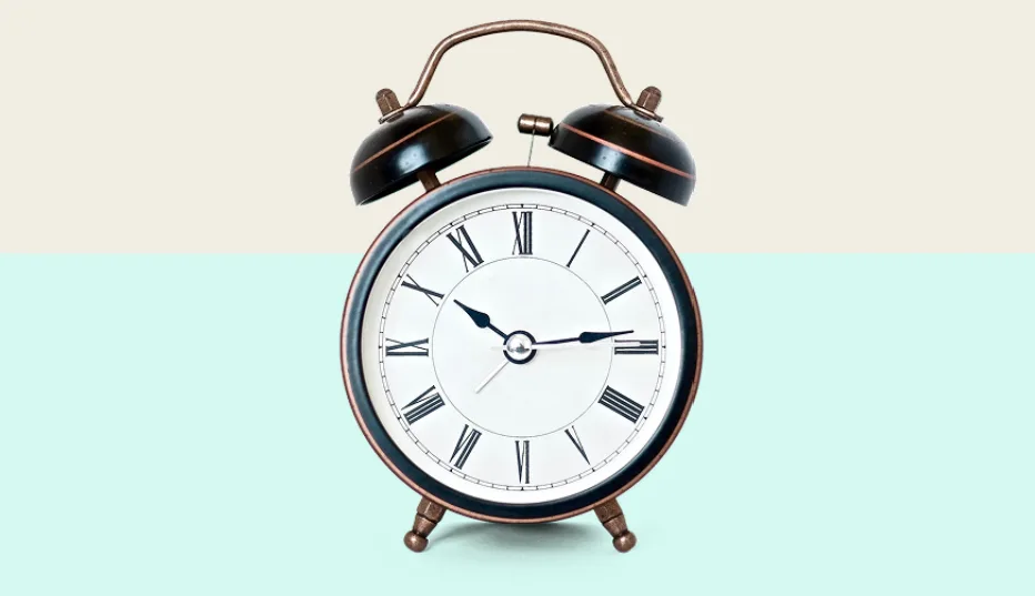 A clock stands ready to give the time.